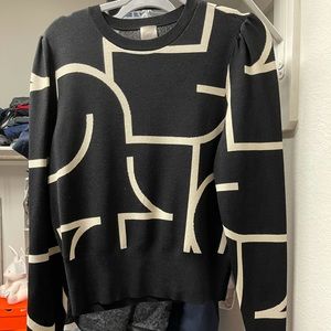 Black and cream sweater